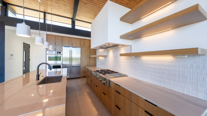 Designer Kitchen with Marble Island & Custom Cabinetry in Luxury Home