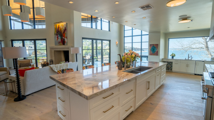 Kitchen island with waterfall edge in custom Texas home