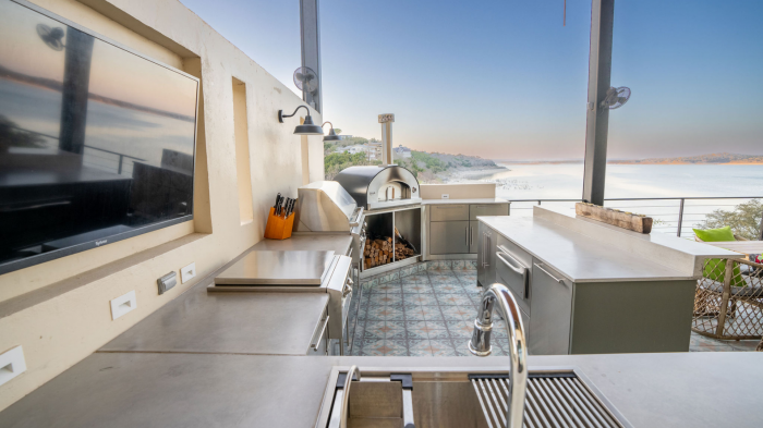 Outdoor kitchen and entertaining space at luxury home