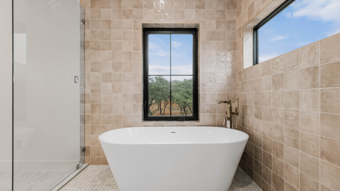 Texas Hill Country custom home with tub in spa like bathroom